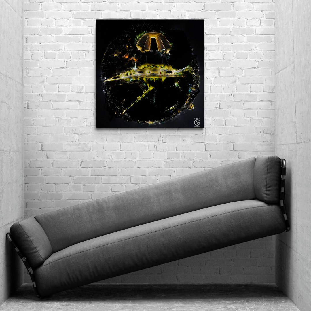 Panathenaic Stadium 360° night canvas in an industrial brick room with a gray sofa.