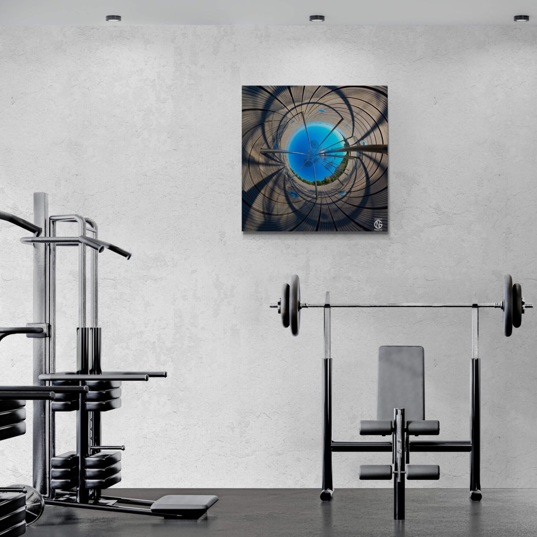 Inverted tiny-planet Umbrellas canvas mounted on a gym wall above weights and bench