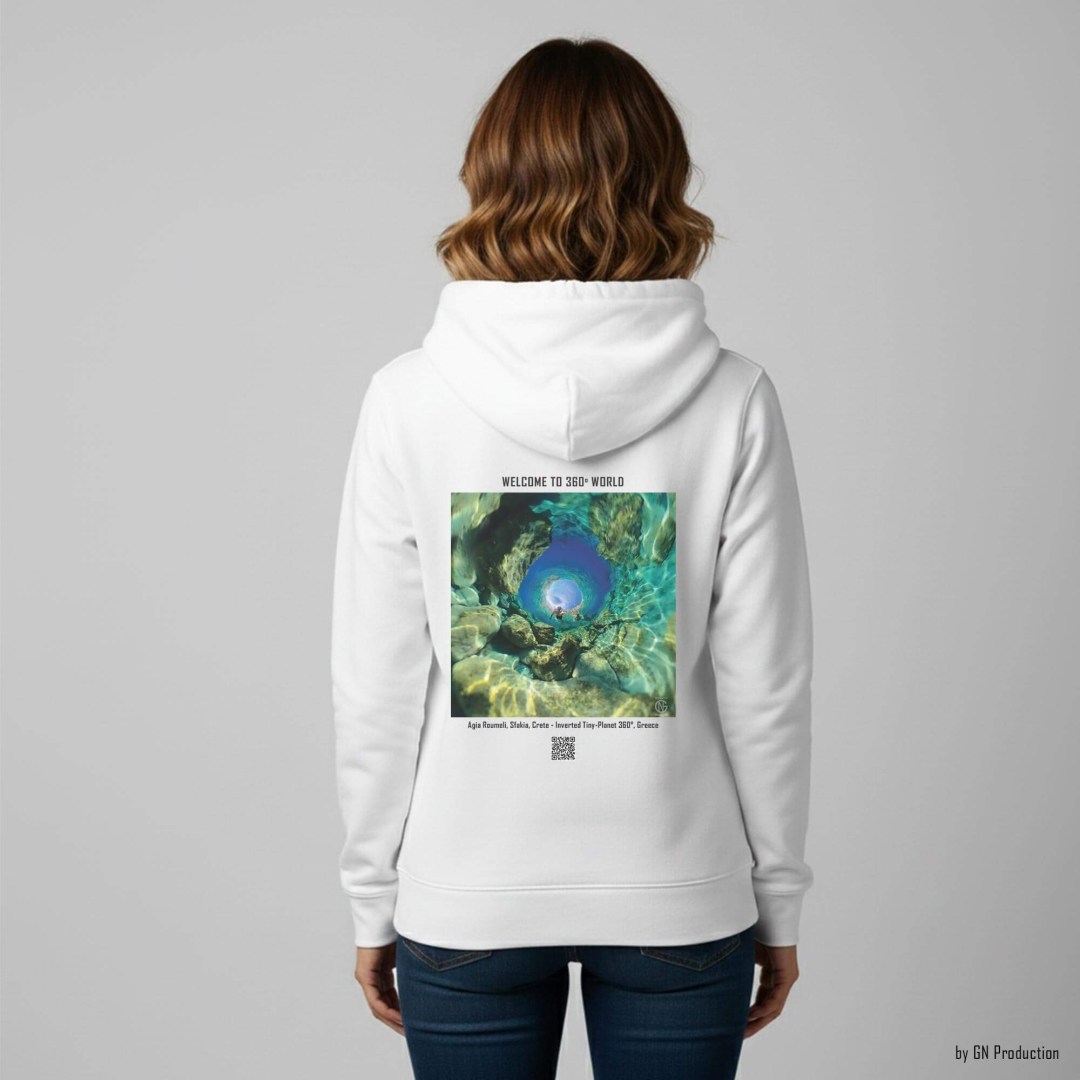 Woman wearing white 360° Art Hoodie featuring Agia Roumeli, Sfakia Crete inverted tiny-planet 360° artwork with turquoise Libyan Sea waters.